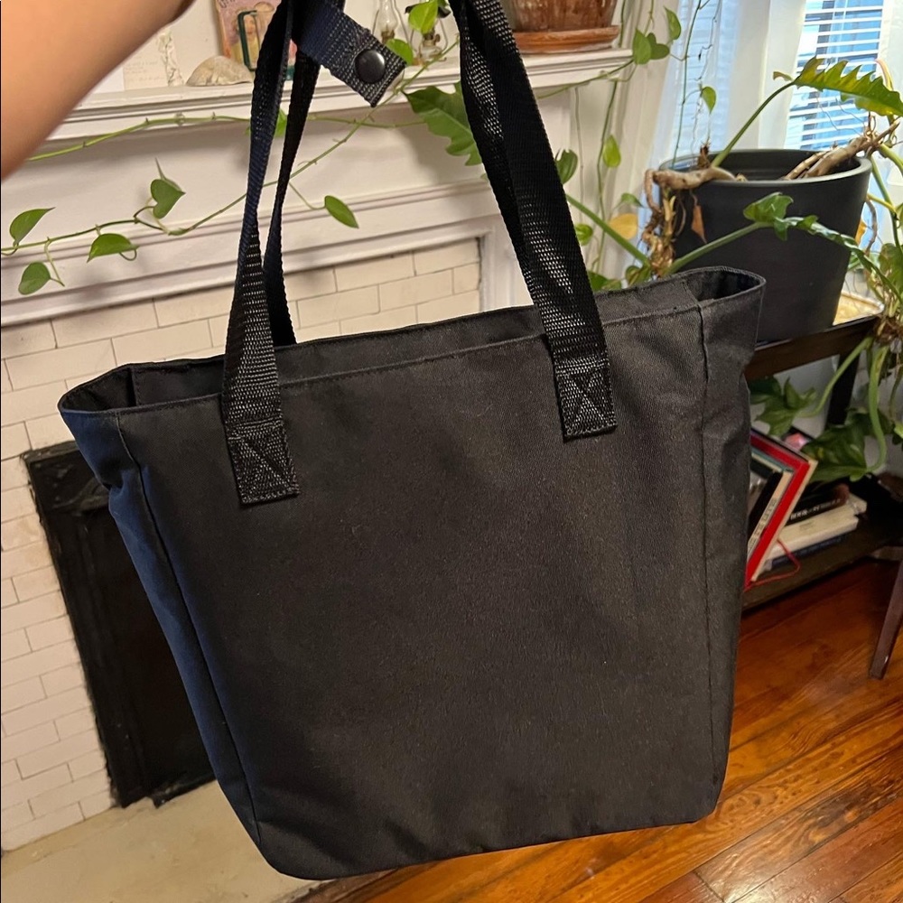 Lo and Sons Edgemont convertible satchel/backpack with luggage slide.